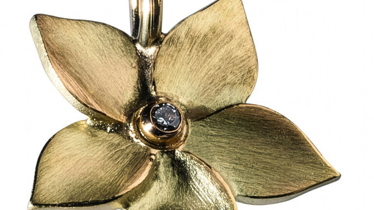 Goldenes BLEAMAL mit Brillant